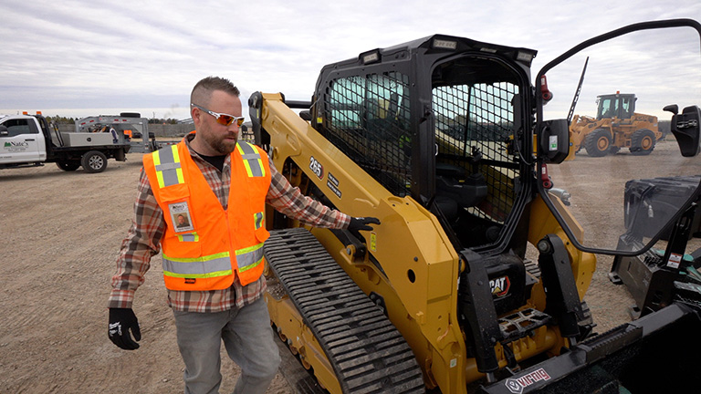 Nate's Snow skid steer operator Nate's Snow skid steer operator